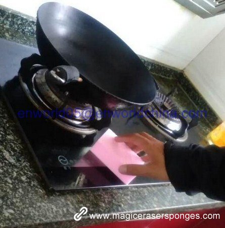 pink color magic sponge clean stove top 